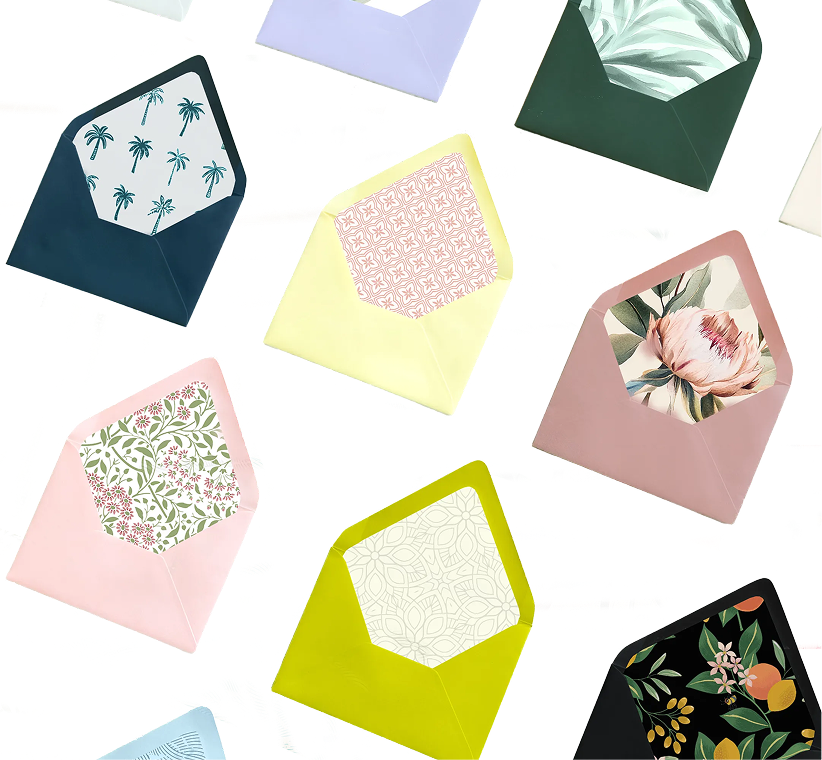 Multiple envelopes in different colors of pink, blue, green and yellow with different floral patterns. Multiple envelopes in different colors of pink, blue, green and yellow with different floral patterns.