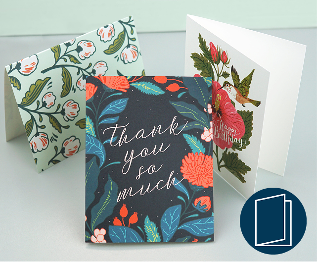 Folded cards in various patterns and designs saying "thank you"