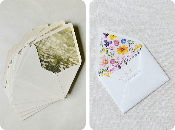 A cream colored envelope with an illustration of a white and green field in the lining. A white envelope with a bright floral pattern in the lining. A cream colored envelope with an illustration of a white and green field in the lining. A white envelope with a bright floral pattern in the lining.